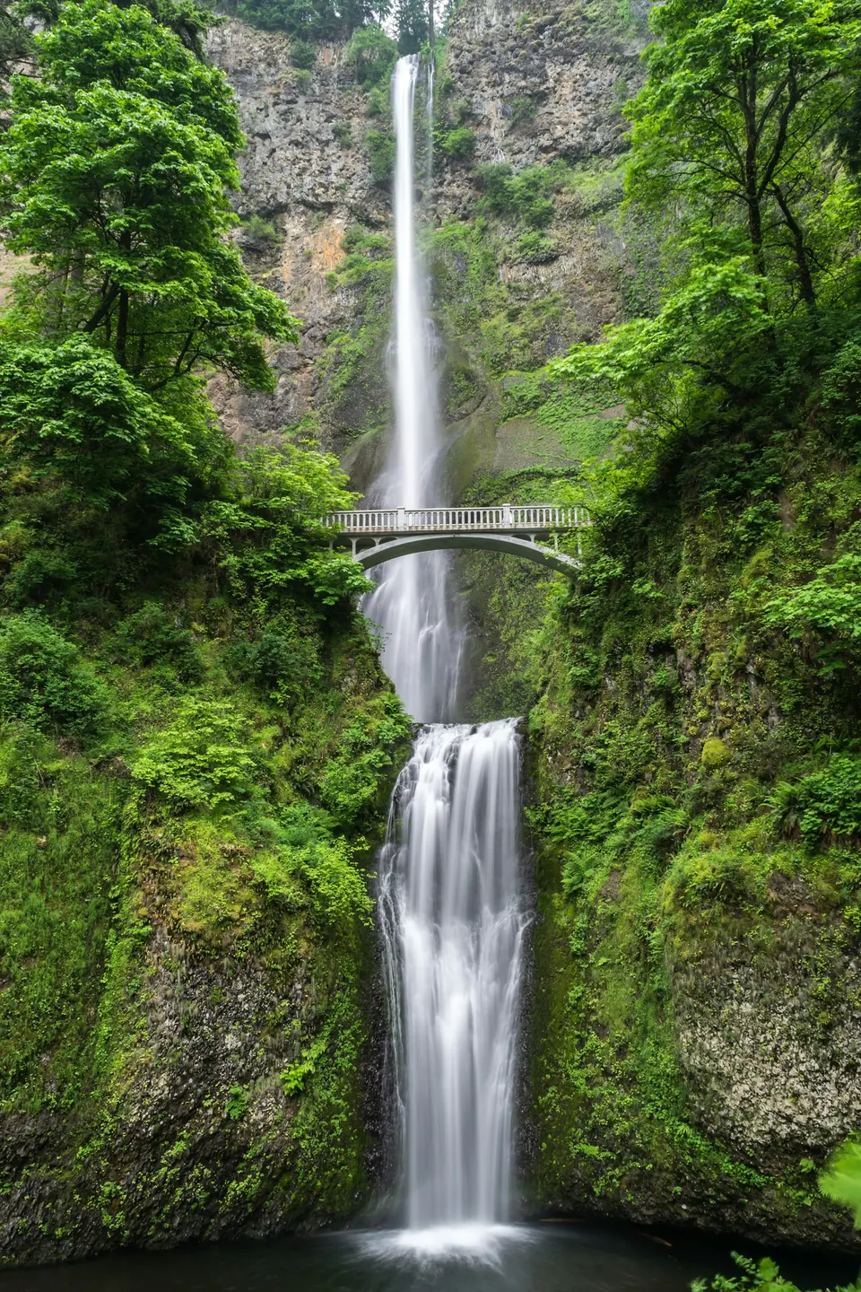 Waterfall cascading over mossy rock