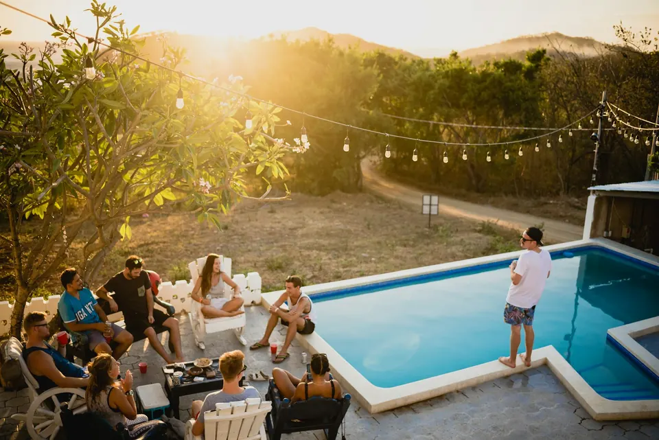 Stone patio with outdoor furniture in the evening