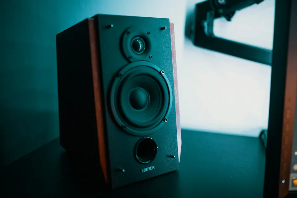 Speaker in low, moody light