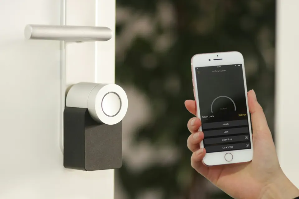 Hand controlling a smart lock from a phone app