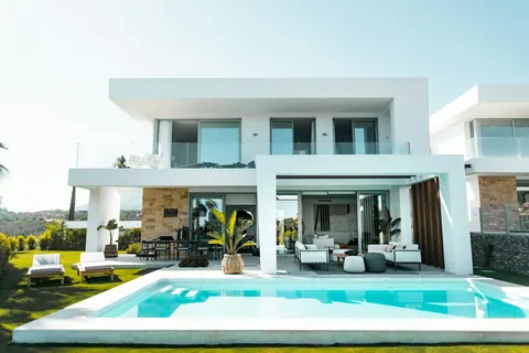 Modern pergola beside a pool at a luxury home
